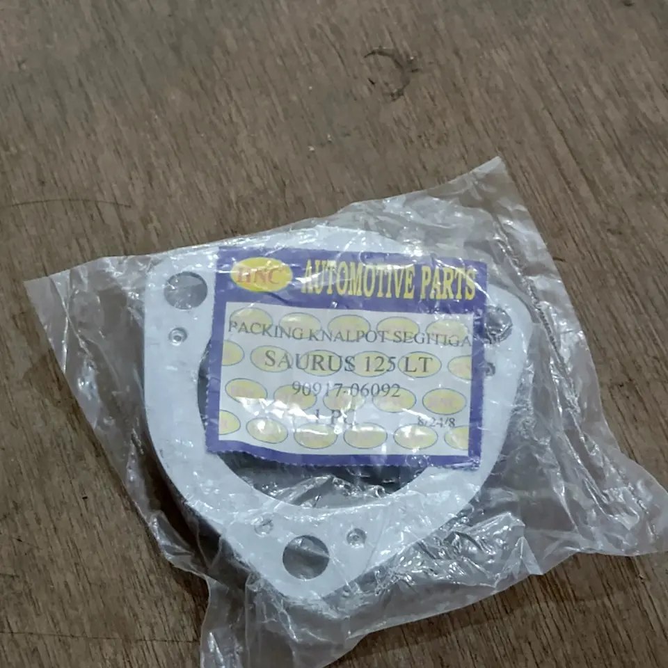 PAKING KNALPOT DYNA 125/130/115/110 (SEGITIGA) HNC 90917-06092 PACKING / PAKING KNALPOT/EXHAUST HNC
