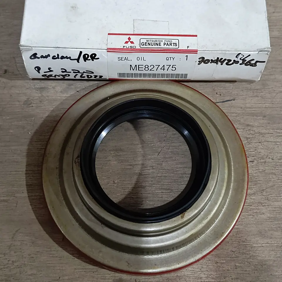 SEAL GARDAN BELAKANG PS 220 / 6D22 MITSUBISHI (70*142*12/36) ME827475 SEAL GARDAN MITSUBISHI