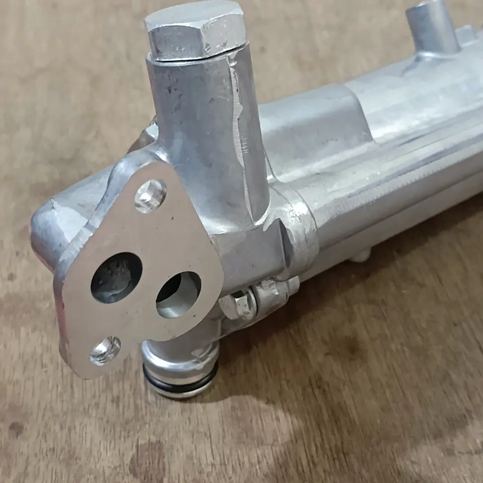 OIL COOLER ASSY PS 120 TITAN